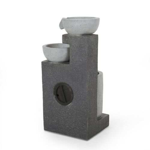 Contemporary outdoor water fountain with concrete bowls and tiered design.
